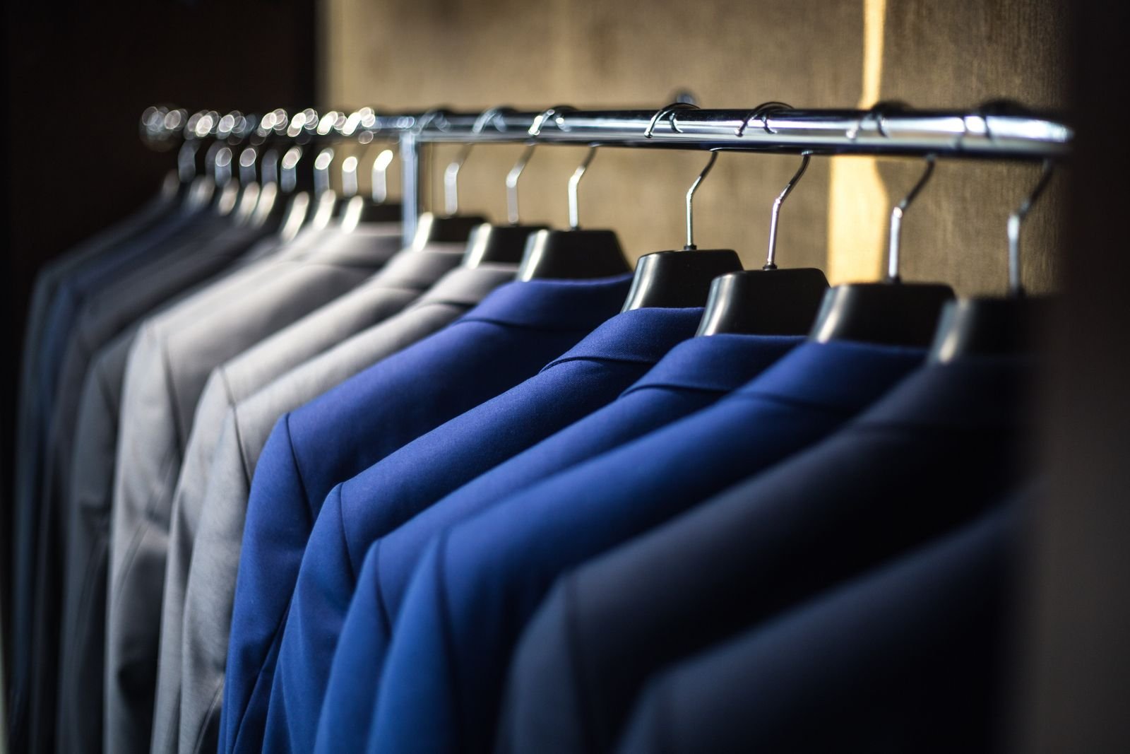 Tailor cutting fabric with shears